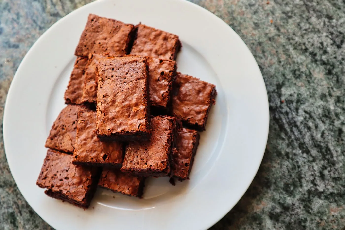 Plate piled with fudgy chocolate brownie squares